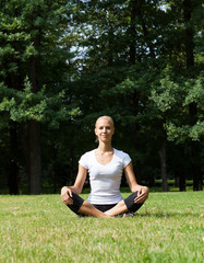 Beautiful woman doing yoga exercises