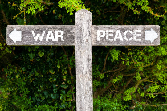 WAR versus PEACE directional signs