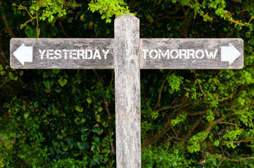 YESTERDAY versus TOMORROW directional signs