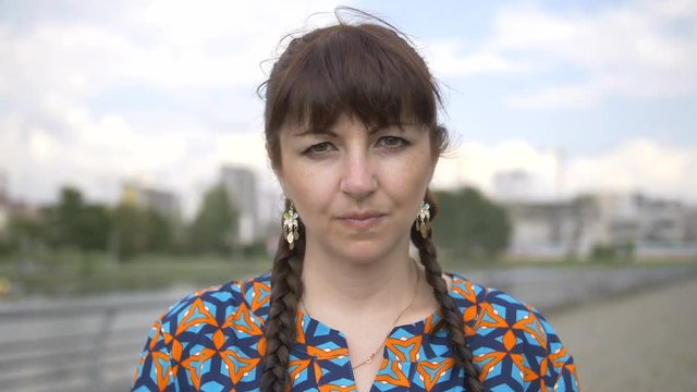 portrait of a woman shows no, woman waving her head negatively