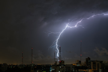 lightning storm over city
