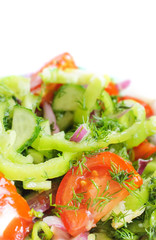 Tomato salad with green peppers and red onions.