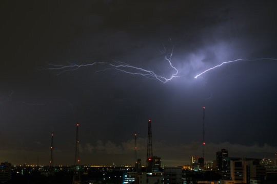 lightning storm over city
