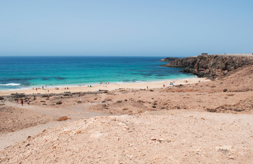 Fototapeta na wymiar Fuerteventura, Isole Canarie: vista panoramica di Piedra Playa, chiamata anche Playa del Castillo, una delle spiagge più famose dell'area nord ovest vicino a El Cotillo, il 31 agosto 2016