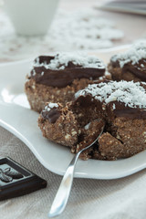Close up of chocolate cakes on a white plate