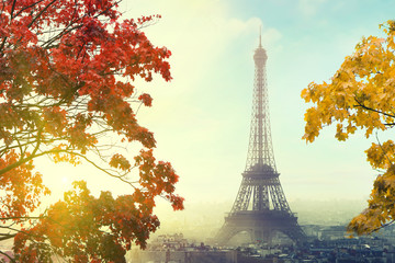 Paris with Eiffel tower at sunset in autumn time