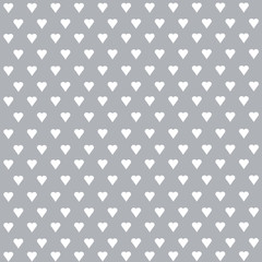 Seamless vector pattern with white hearts on pastel background