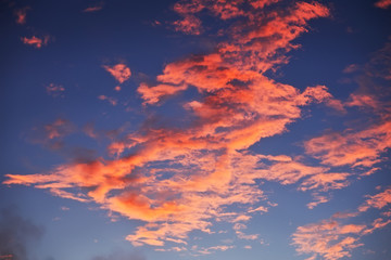 Fototapeta na wymiar Beautiful dramatic sunset sky with red clouds