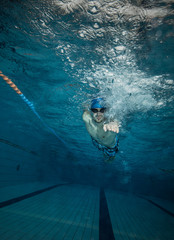 Male swimmer at the swimming pool.