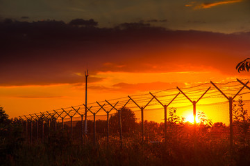 Zaun im Abendlicht