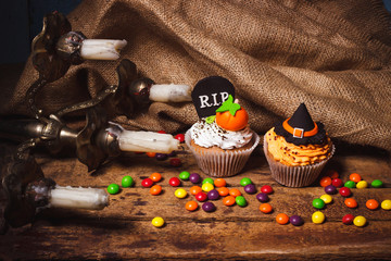 Halloween cupcakes with colored decorations