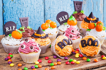 Halloween cupcakes with colored mastic decorations