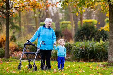 Senior lady with walker enjoying family visit