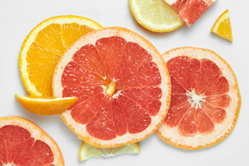 Fototapeta na wymiar Mix fresh sliced orange, lemon and grapefruit