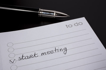 to do list on black background - start meeting
