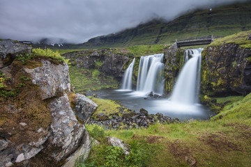 stoned ghost with waterfall in Iceland