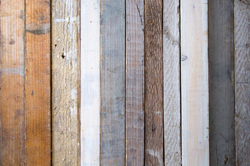 Wooden background from old raw boards