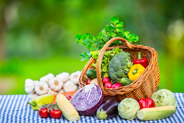 Vegetables. Fresh mix vegetable on table in the background garden. Assortment of fresh vegetables close up.