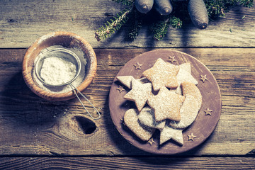 Tasty and sweet Christmas cookies on wooden table
