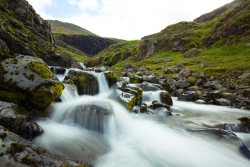Fototapeta na wymiar Waterfall. Water running over rocks. Iceland.