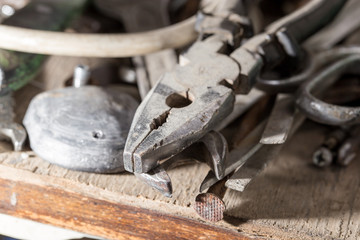 old pliers on shelf