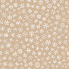 Seamless pattern of snowflakes, white on light brown