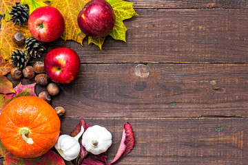 harvest or thanksgiving background with autumnal fruits and vegetables