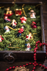 wooden box with vintage christmas ornaments