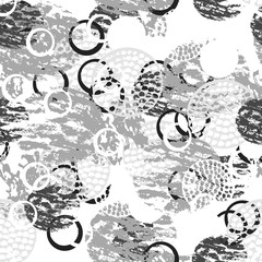 Black and white grunge abstract seamless pattern with circles rings different brush strokes and shapes. Infinity textured circles background. Vector illustration.