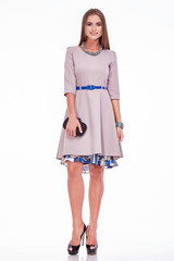 Beauty stylish woman wear silk dress fashion style look business clothes casual for meeting and party sexy woman with long brunette hair and tanned skin makeup hold in hand bag lady.