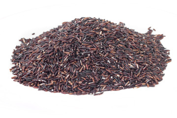 Red rice on white background.