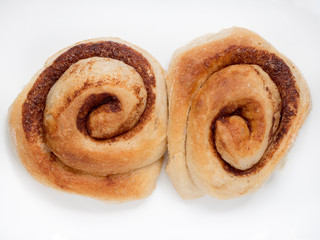 Homemade cinnamon rolls on the isolated white background