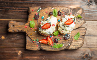 bruschetta with cottage cheese on wooden board