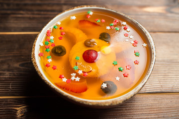 jelly with pineapple on white plate