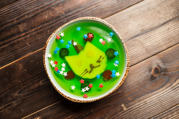 jelly with apple on white plate