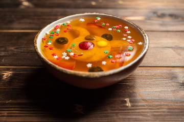 jelly with pineapple on white plate
