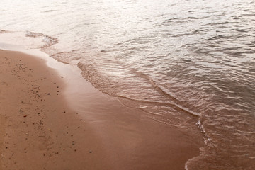 sandy shore of the sea as a backdrop
