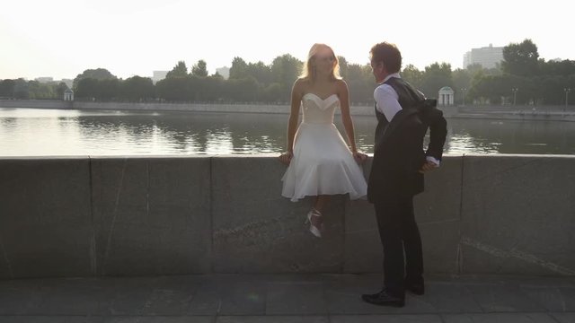 Outdoor wedding. Groom comes to bide