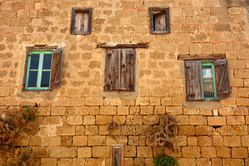 Fototapeta na wymiar brickwork of old castle with window