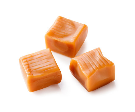 toffee caramel candies close-up isolated on white background (with clipping path)

