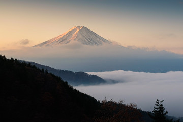 Fototapeta premium Mount Fuji with mist at sunrise, Japan