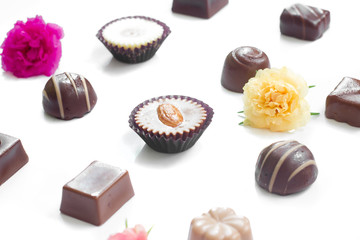 Chocolate candy set on white background.