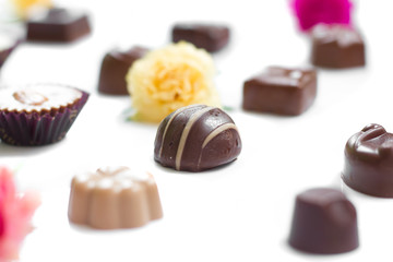 Chocolate candy set on white background.
