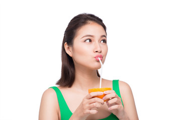 Beautiful asian girl with juice, isolated on white