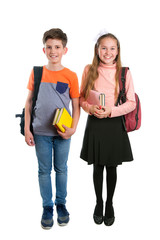 A schoolgirl and schoolboy with book and backpack, isolated on white background - 121081645