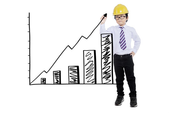 Boy with helmet drawing financial graph
