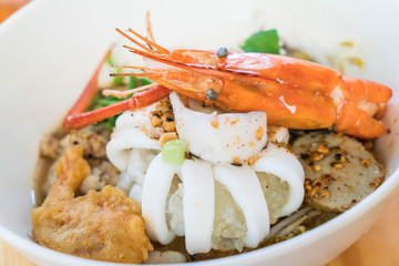 Asian seafood spicy noodle soup