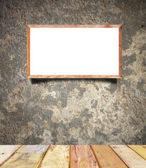 Image of blank vintage wood frame on grunge wall