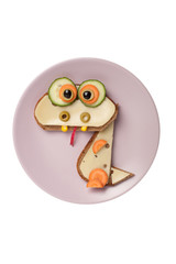 Surprised sandwich dragon made on purple plate
