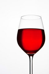 Glass of red wine isolated. Copyspace